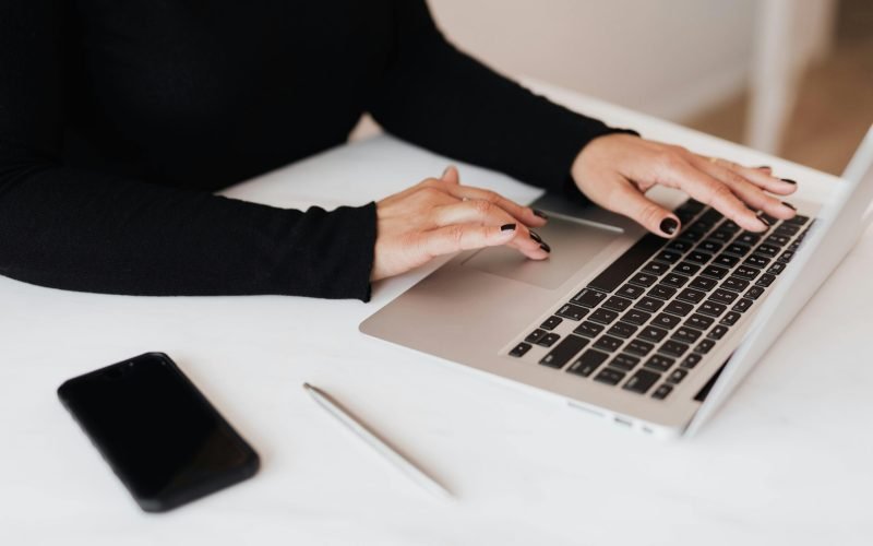 lady sitting down at the desk working