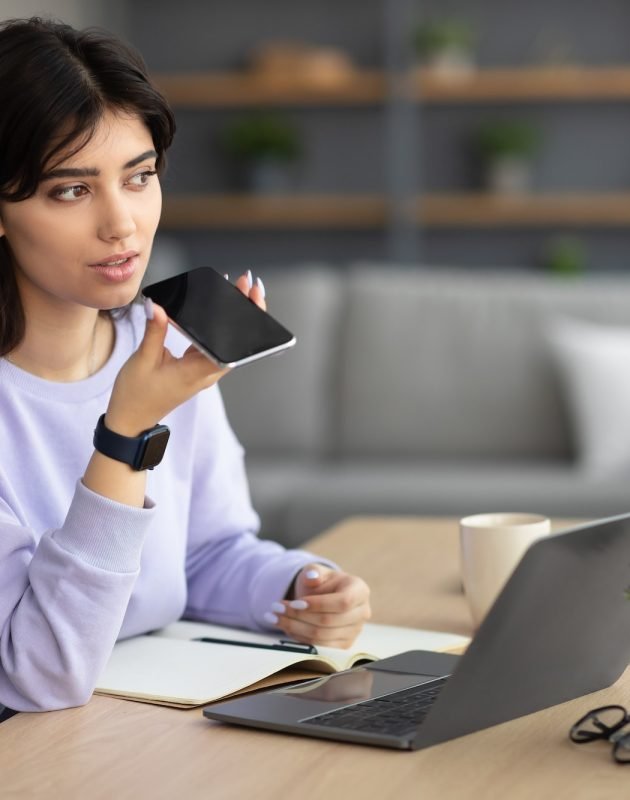 woman-using-voice-search-assistant-on-smart-phone.jpg